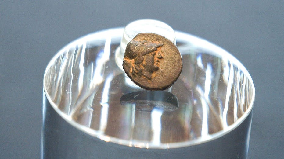 Teen stumbles on mysterious coin from legendary city, puzzling archaeologists over its journey Church Find